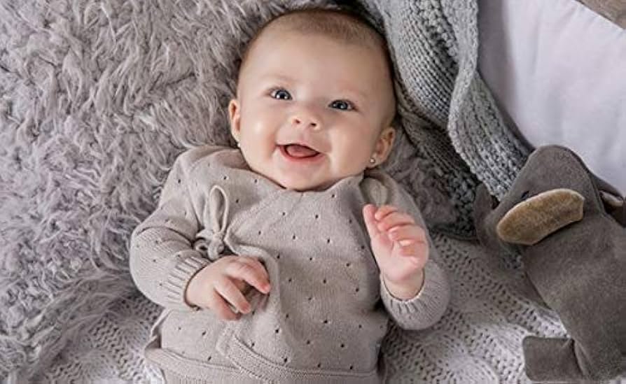 primera puesta del bebé con ropa y accesorios esenciales 2025