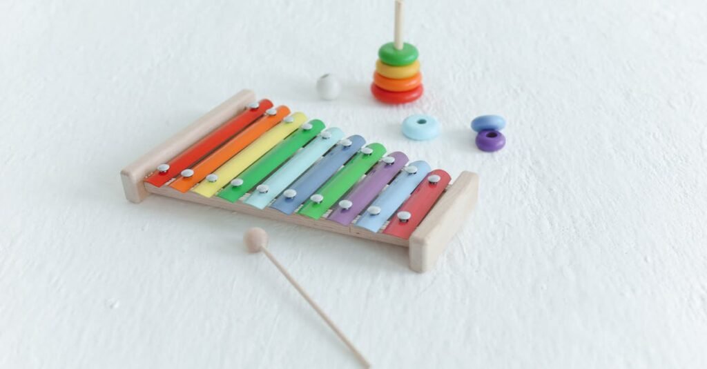 Vibrant xylophone and stacking toys on a white background, ideal for educational and fun themes.